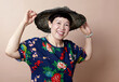 © ChaoShu Li/Stocksy - Asian woman in joyful mood indoors