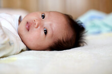 Closeup Expression Of Asian Newborn Baby