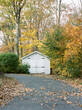© Minette Hand/Stocksy - Garage in the Fall