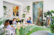 © Studio Marmellata/Stocksy - Coworkers discussing project in workplace