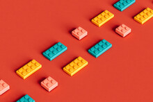 Rows Of Pink, Blue And Yellow Building Blocks
