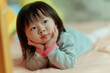 © Pansfun Images/Stocksy - cute little child on bed