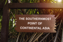 The Southernmost Point Of Continental Asia Sign At Pulau Palawan (Palawan Island), Small Islet Of Sentosa Island, Singapore.