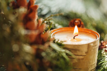 Candle In Pine Bough Decoration