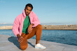 © Alba Vitta/Stocksy - Portrait of fashion  young man posing outdoors