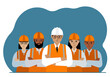 A team of smiling construction workers in white and orange hard hats and orange vests. Engineer and builders.