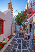 View Of Cafe In Colourful Narrow Cobbled Street, Mykonos Town, Mykonos, Cyclades Islands, Greek Islands, Aegean Sea