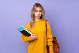 Fototapeta  - Teenager Russian student girl isolated on purple background with sad and depressed expression