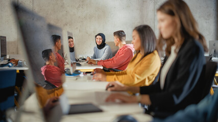 Fototapete - Smart Young Students Studying in University with Diverse Multiethnic Classmates. Scholars Collaborate in College Room with Computers. Applying Knowledge to Acquire Academic Skills in Class.
