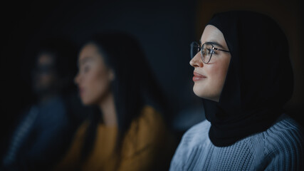 Fototapete - Beautiful Close Up Portrait of a Multiethnic Muslim Female Wearing Hijab and Glasses, Charmingly Smiling and Posing on Camera. Happy Diverse Young Woman in Casual Clothes Indoors.