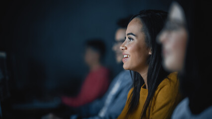 Fototapete - Diverse Multiethnic Group of Female and Male Students Sitting in College Room, Collaborating on School Projects on a Computer. Young Scholars Study, Talk, Apply Academic Skills and Knowledge in Class.