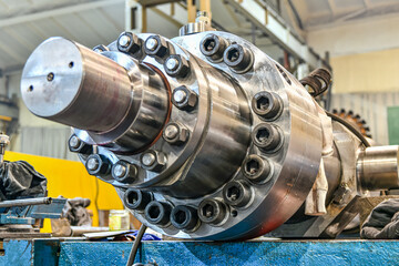 Wall Mural - High pressure hydraulic pump in a machine shop repair shop.