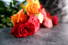 Bouquet Of Yellow, Red, Pink Roses With A Copy Space For The Designer, Flowers For Professional Holiday On An Gray Background, Concept Of Mother's, Valentine's Day, Birthday, Selective Focus
