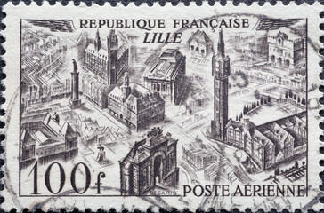 Wall Mural - France - circa 1949: A ppostage stamp from France showing a Views of the town - Lille