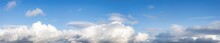 Panoramic View Of Cloudscape During A Cloudy Blue Sky Sunny Day. Taken On The West Coast Of British Columbia, Canada.