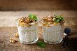 Greek yogurt millet caramelized apple walnuts parfait in a glass