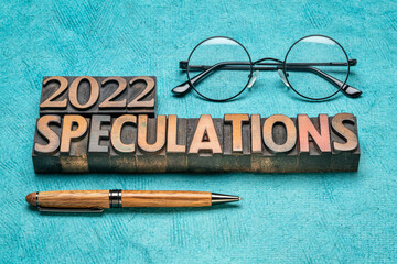 Wall Mural - 2022 year speculations concept - text in vintage letterpress wood type printing blocks with reading glasses, expectations and predictions for the New Year