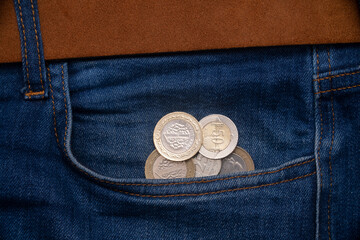 Money in blue jeans pocket