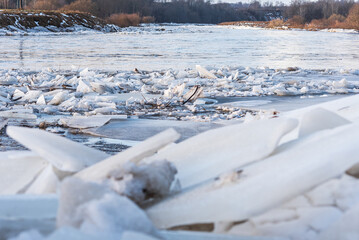 Canvas Print - Close up view of ice drift on the frozen river. Melting ice. Stack of ice. Concept of spring floods