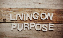 Living On Purpose Alphabet Letters On Wooden Background