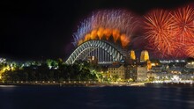 City Harbour Bridge Illuminated With Vivid Colours From NYE New Years Eve Fireworks NSW Australia 
