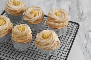 Freshly baked brazo de mercedes cupcakes