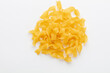 Raw pasta isolated on white background.