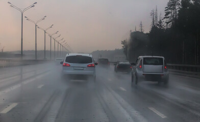 Wall Mural - traffic in heavy rain on highway.