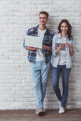 Canvas Print - Young couple in the studio