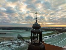 Church Tower With Seated Pigeons Drone Photo In Winter Time