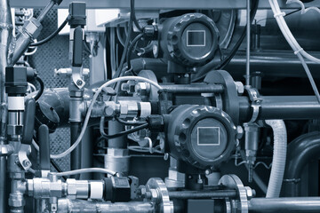 Aufkleber - Close up of manometer, pipe, flow meter, water pumps and valves of heating system in a boiler room