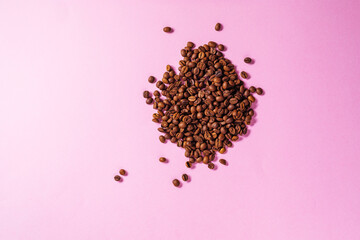 Wall Mural - A cup of black coffee on a purple background with hear shape around made from coffee beans. Ideal concept for cheer coffee day, international barista day or anything related to coffee