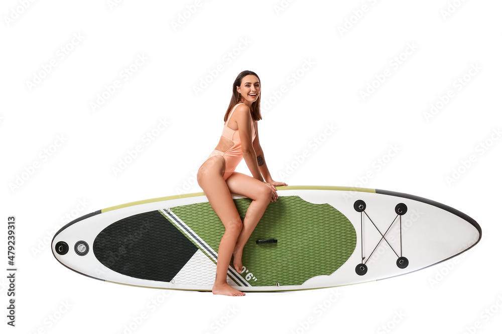 Beautiful young woman with board for sup surfing on white background