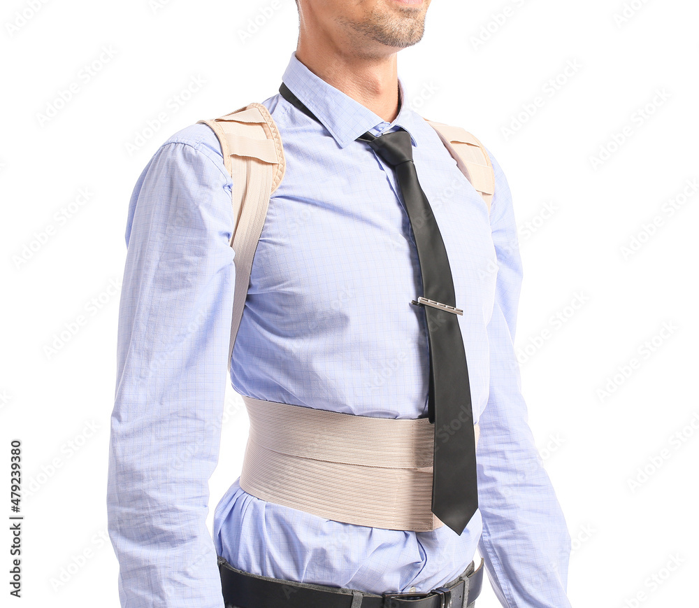 Businessman in back brace on white background