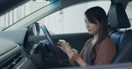 Poster - Woman check location on cellphone before drive her car