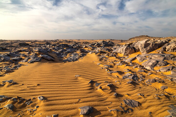 Wall Mural - Rocky landscape at sunset in the White Desert, Egypt.