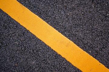 New asphalt road surface with yellow line background