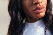 © Raul Mellado - full-lipped mouth of a young black woman