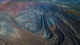 Fototapeta  - Huge iron ore quarry iron ore quarry top view Aero photo shoot.