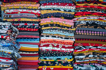 Wall Mural - Lots of colorful fabrics in street market for sale, Vietnam