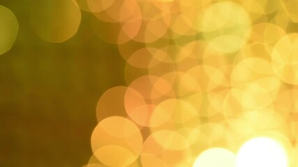 Wall Mural - Looped movement of golden yellow bokeh from left to right. HD Loop Light Leaks overlay. 