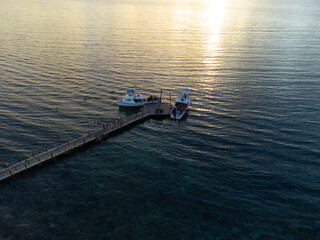 Aerial photo of a boat on the beach of Cozumel in Mexico