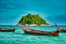 Thai Traditional Long Tail Boats Resting On The Shores Of The Magical Island Koh Lipe