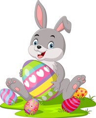 Poster - Cute little bunny with Easter egg in the grass