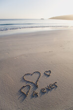 Love Hearts And Forever Written On A Pristine Beach