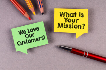 Wall Mural - Mission and Customers concept. Two speech bubbles on a gray office desk