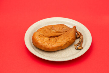 Wall Mural - typical portuguese smoked sausage Farinheira on the dish