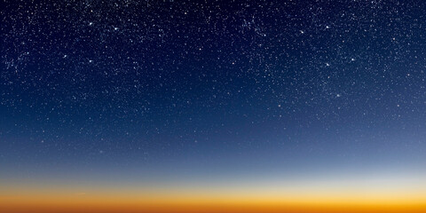 Wall Mural - a beautiful dawn of the sun with stars, gradient from blue to red