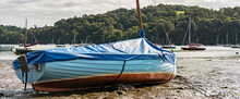 Beached Sailing Boat At Low Tide On The River Dart Near Dittisham, South Devon, United Kingdom