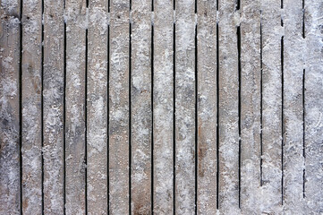 Ice on wooden desks, planks